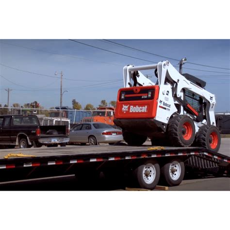 how to load a skid steer onto a trailer|securing skid steer on trailer.